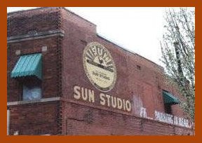 Sun logo on building