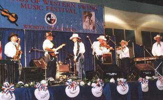 Bill with his band on stage at the Legends Festival 2001