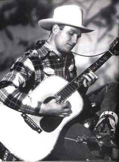 Gene Autry playing guitar